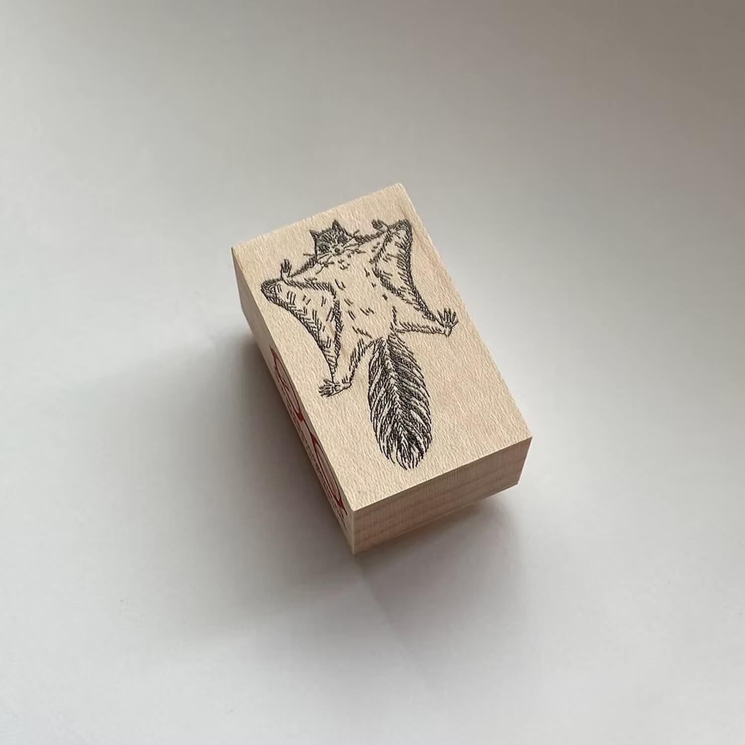 Akamegane Wood Mount Stamp – Damian the Flying Squirrel