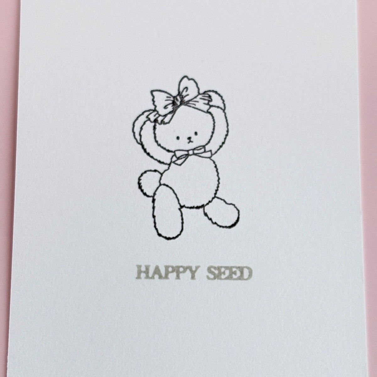 Happy Seed Stamp – nono the Bear Holding a Ribbon