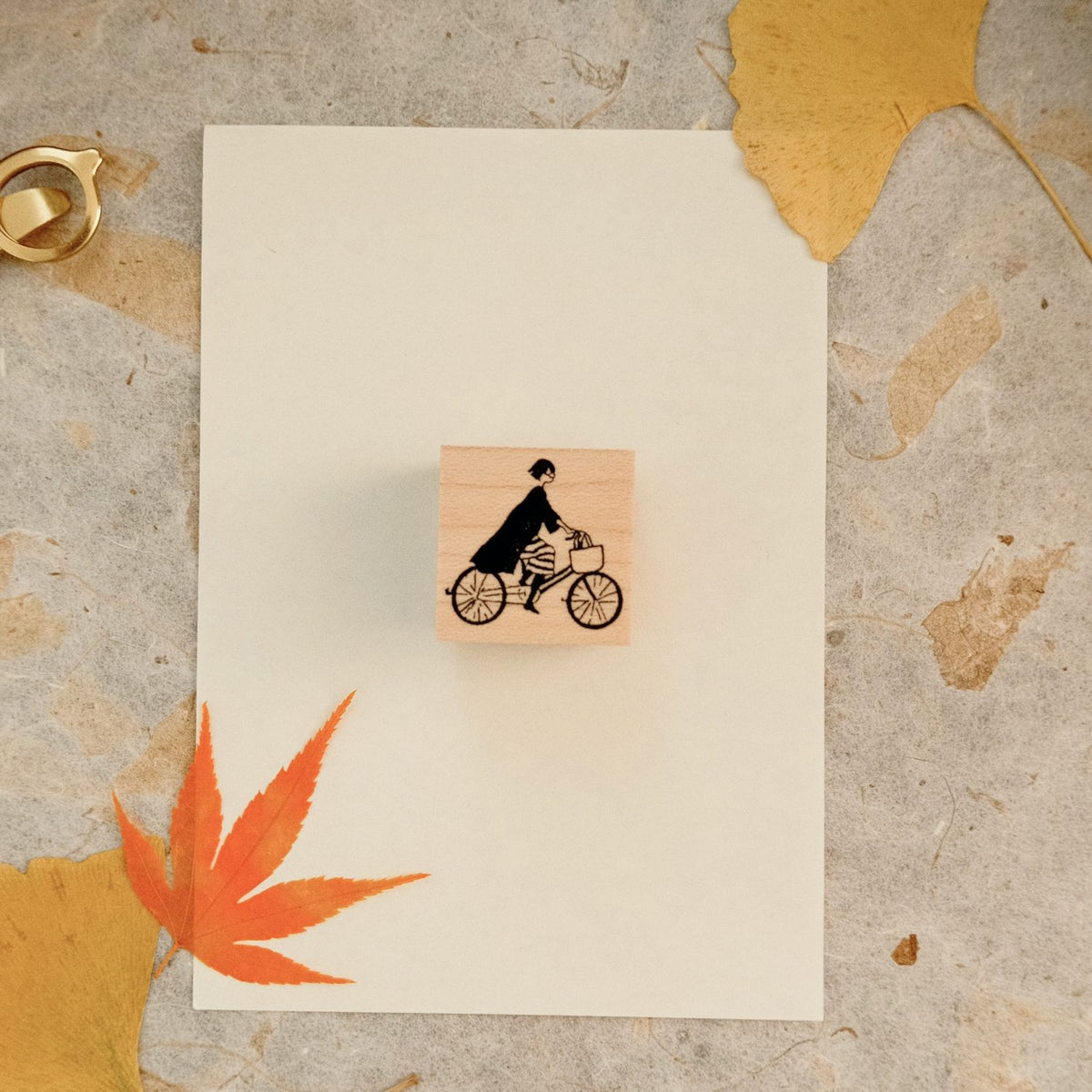 MA7 Stamp Stamp - Fumiko on Her Bicycle