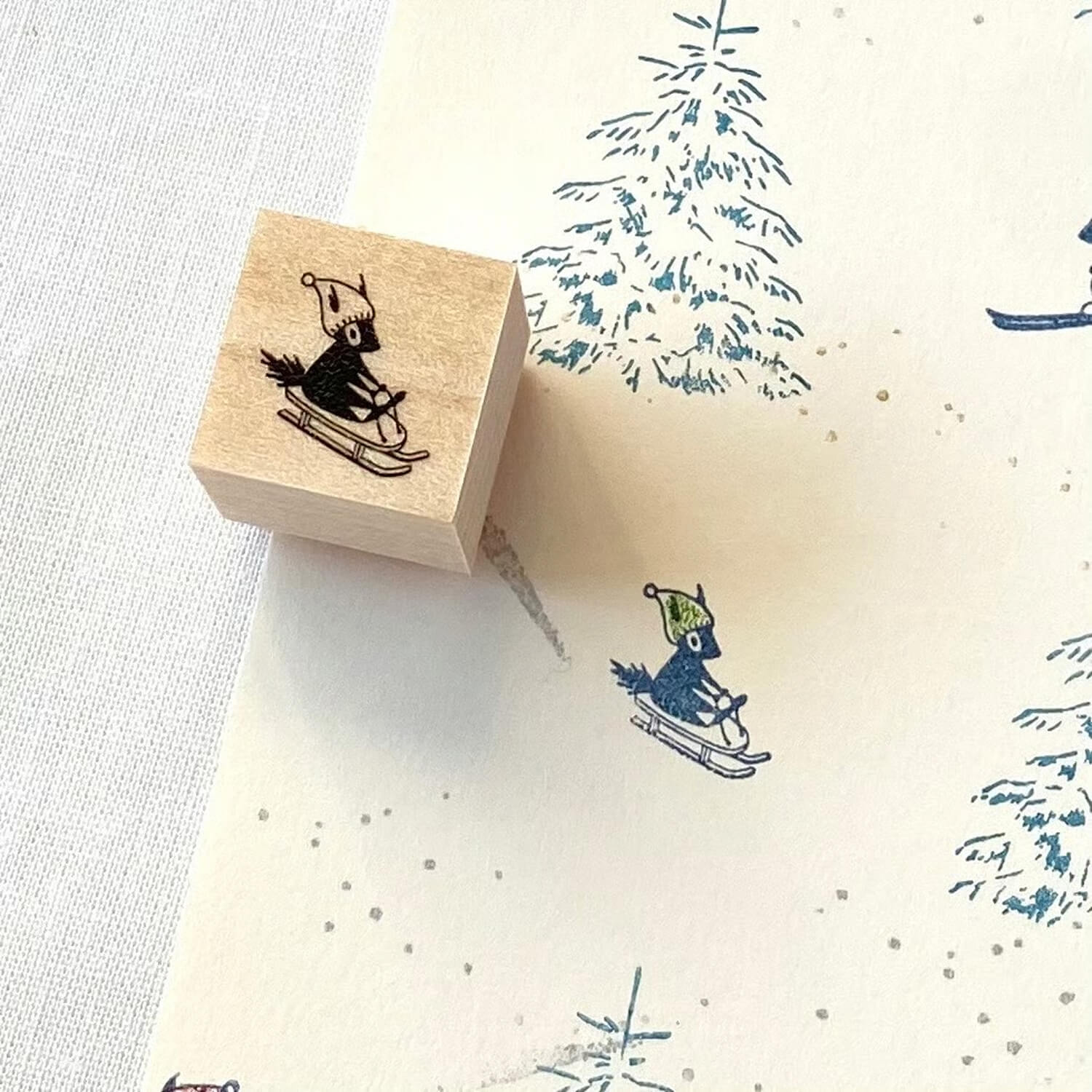 Mori Ringo Rubber Stamp – Squirrel on a Sled